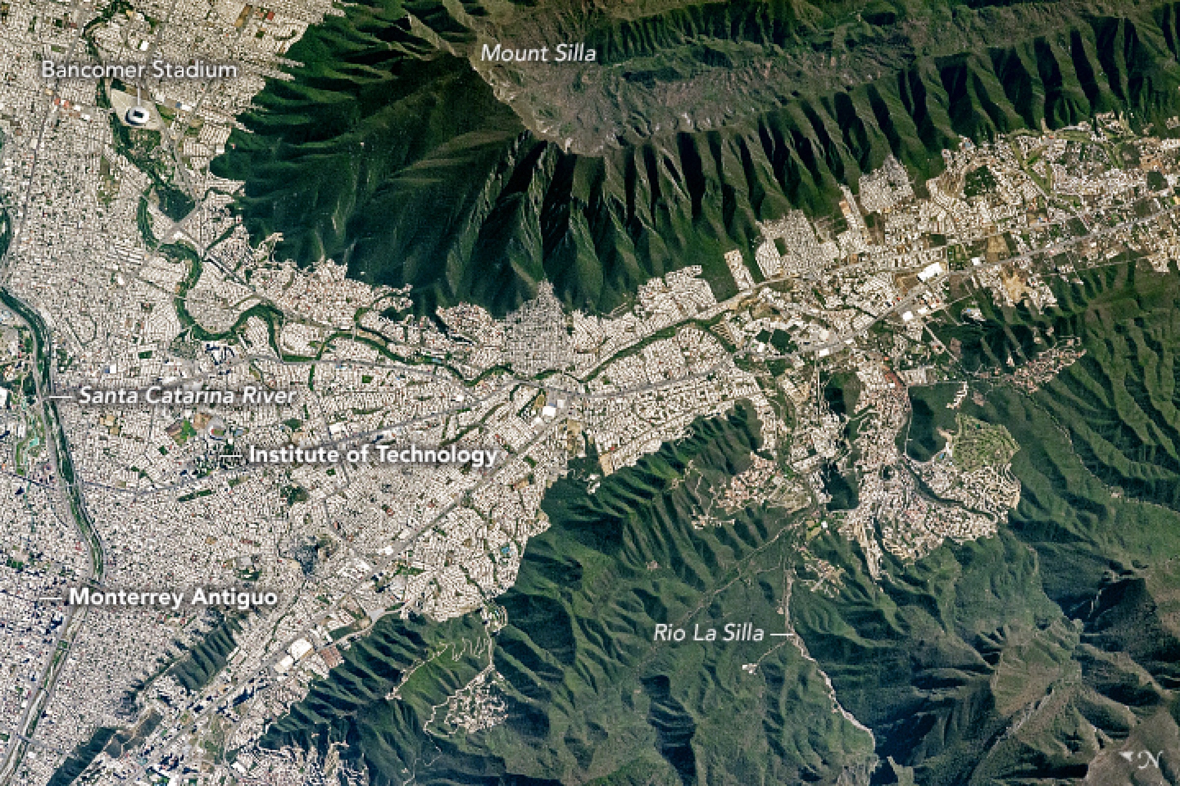 Aerial labeled view of Monterrey showing key neighborhoods and rivers